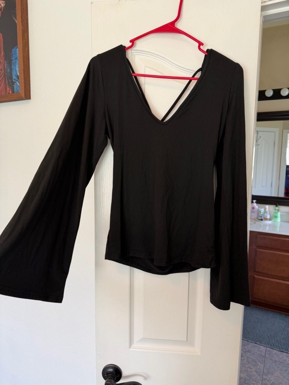 Black backless V-Neck Long Sleeve Women's Top with bell sleeves